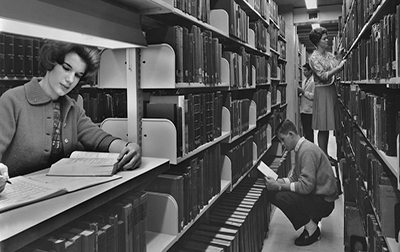 Students in an archive